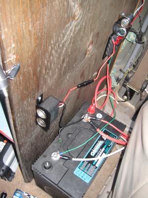 Deep Cell &amp; fuse box behind drivers seat.  The fuse box is mounted to a divider that I have behind the drivers seat.